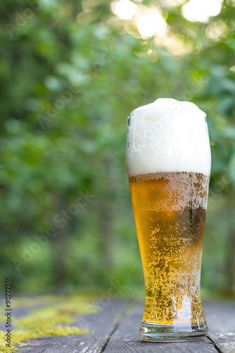 Glass of beer in nature.