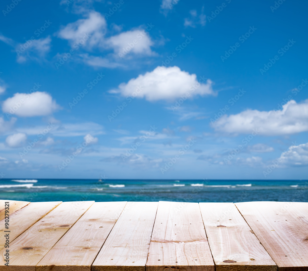 Wood table with sea background