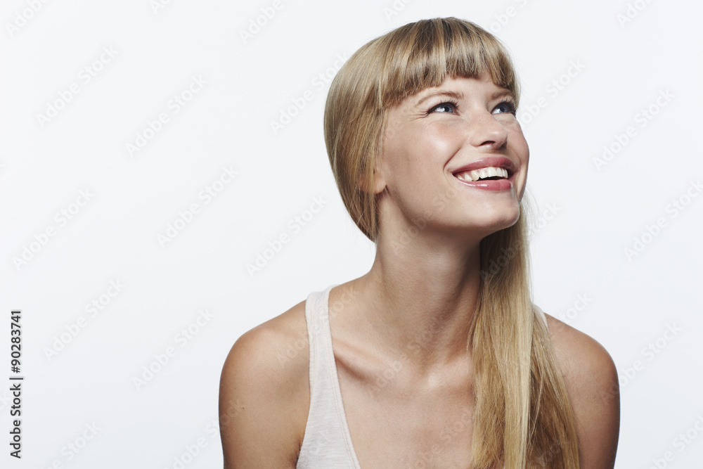 Naklejka premium Beautiful and inspired young woman in studio