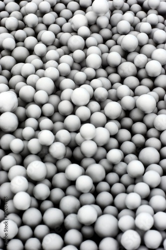 Silhouette of foam balls on the light.Create for background texture.