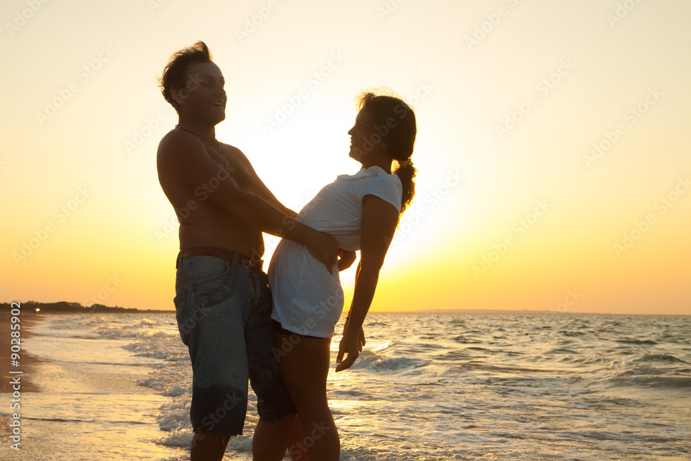 happy couple on the beach