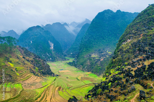 Green valley in Ha Giang, Vietnam. Ha Giang is a province in northeastern Vietnam. It is located in the far north of the country, and contains Vietnam's northernmost point.
