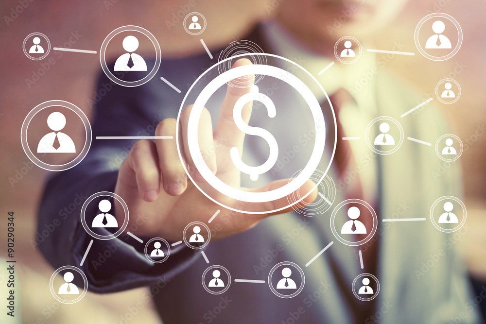 Businessman pushing online button with dollar icon Businessman pushing online button with dollar icon