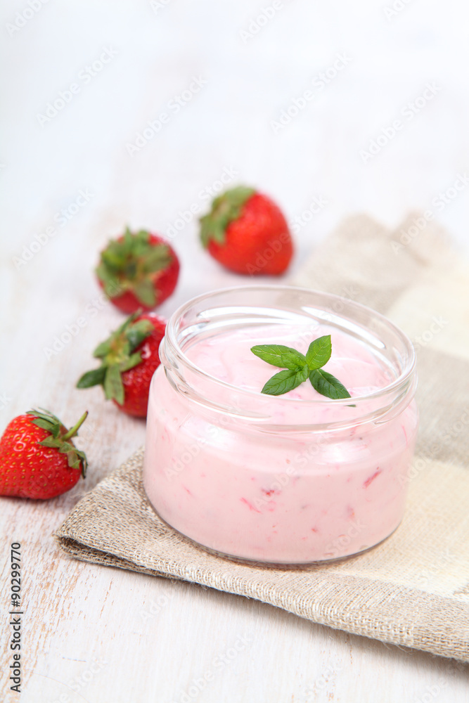 Strawberry yogurt and ripe strawberry Strawberry yogurt and ripe strawberry