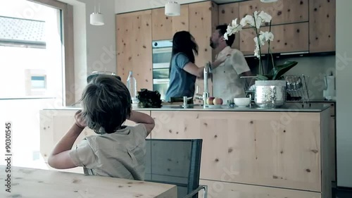 Man hitting wife at home in front of little son crying