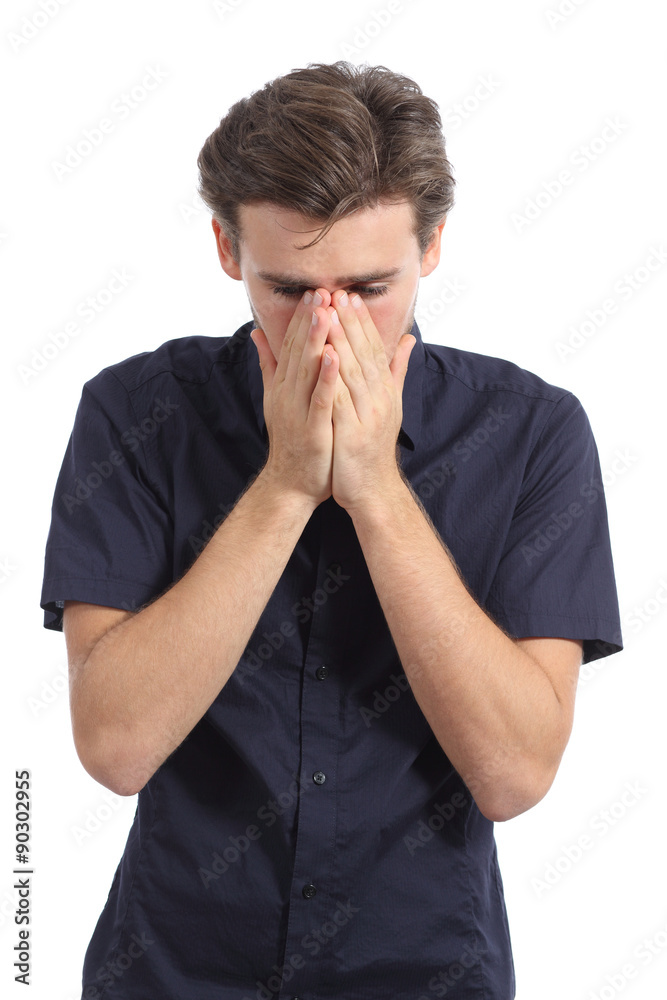 Ashamed or worried man covering mouth with his hands Ashamed or worried man covering mouth with his hands
