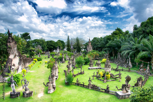 Amazing view of mythology and religious statues at Wat Xieng Khuan Buddha park. Vientiane, Laos photo