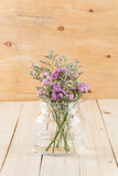 statice flower bouquet  on wood background