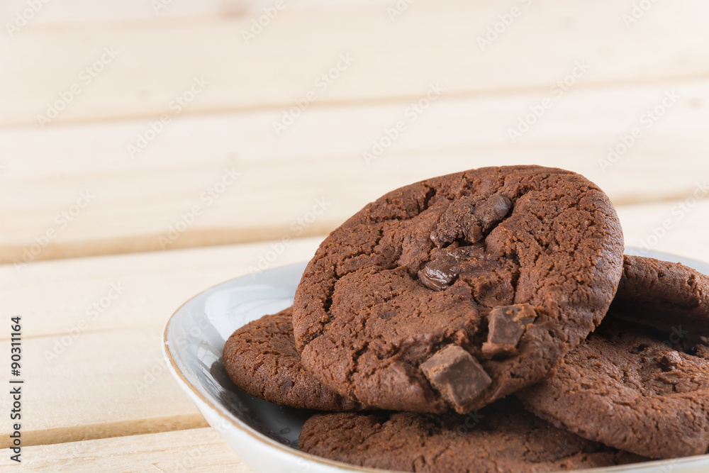 soft dark chocolate brownie cookies on wood soft dark chocolate brownie cookies on wood