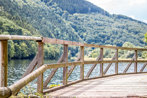 wooden bridge on the river