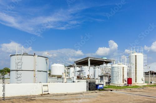 chemistry tank in factory with blue sky