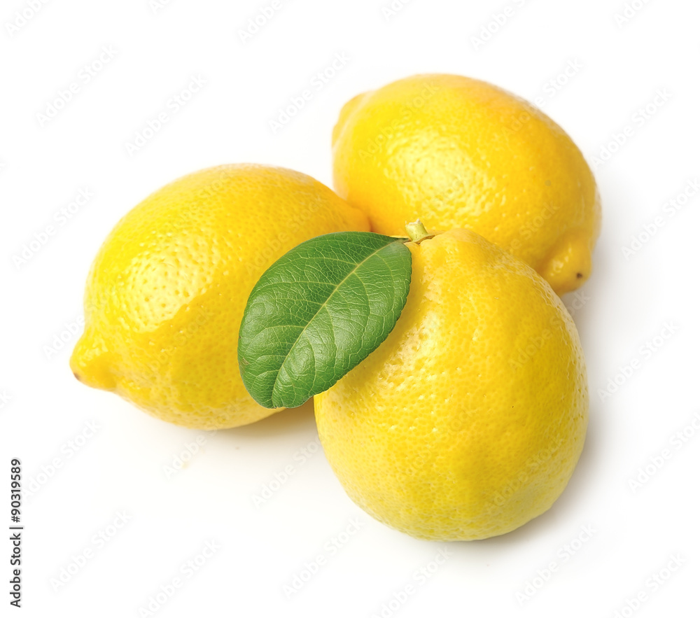 Lemon fruits with leaves on white