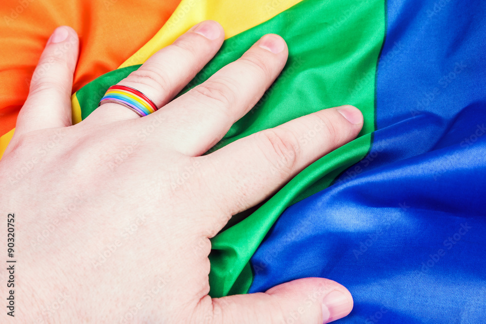 Fototapeta premium Ring rainbow gay on his finger