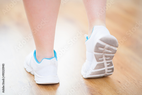 legs in sport shoes