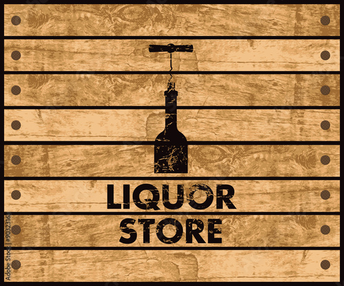 wooden box with a picture of the bottle of wine and liquor store sign photo