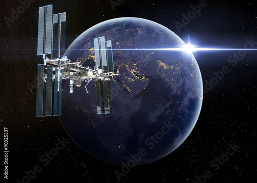 Fototapeta Naklejka Na Ścianę i Meble -  Space Station Orbiting Earth