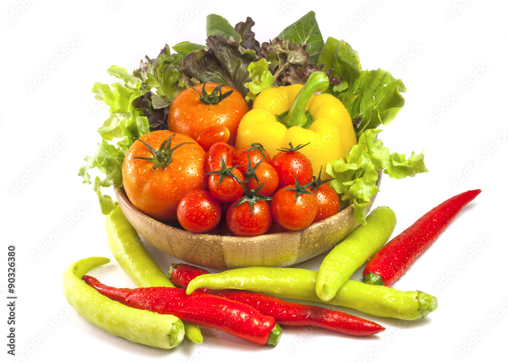 Mixed collection of vegetables isolated on a white background. Bowl of salad with fresh organic vegetables for healthy. Mixed collection of vegetables isolated on a white background. Bowl of salad with fresh organic vegetables for healthy.