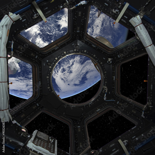 Fototapeta Naklejka Na Ścianę i Meble -  Earth planet in space ship window porthole