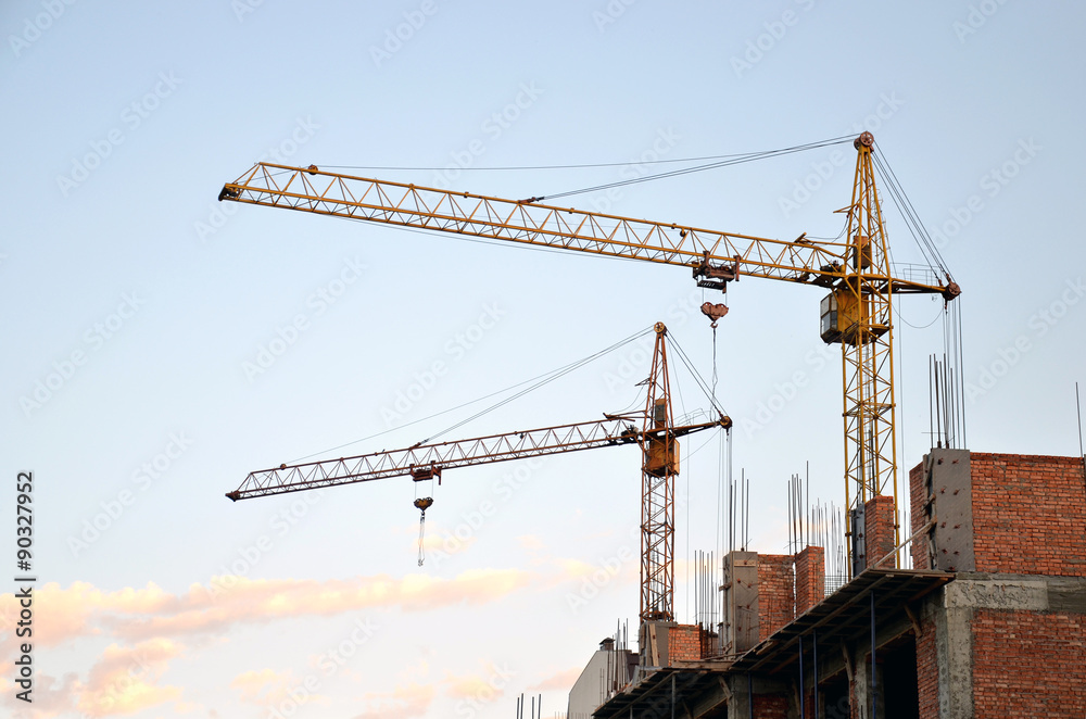 tower cranes on the construction