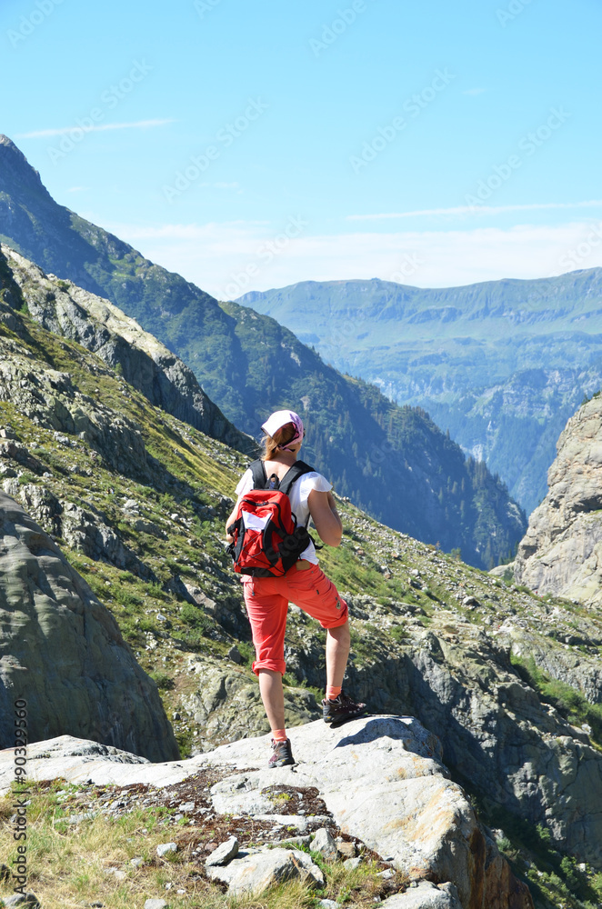 Fototapeta premium Traveler in the Swiss Alps