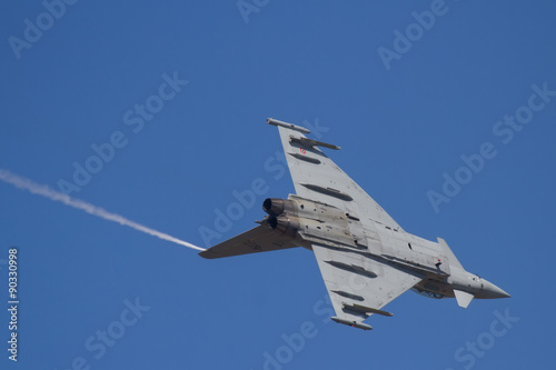 Military jet on traning photo
