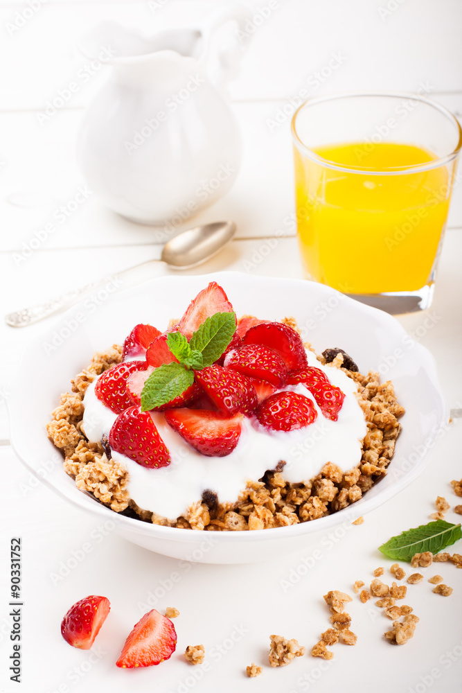 Yogurt with granola and fresh strawberries Yogurt with granola and fresh strawberries