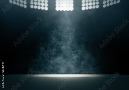 Spotlight and smoke on stage photo