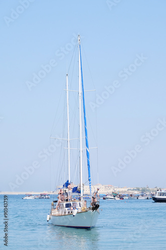 The image of sailer in the sea