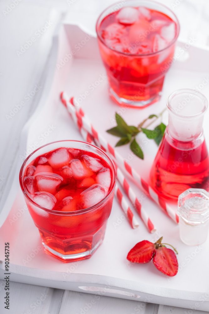 Strawberry drink with ice on a white background.selective focus Strawberry drink with ice on a white background.selective focus