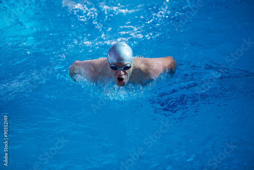 swimmer excercise on indoor swimming poo © .shock