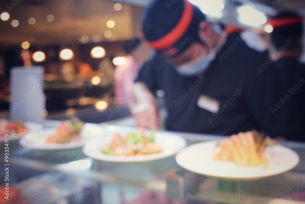 Blurred of japanese chef in restaurant