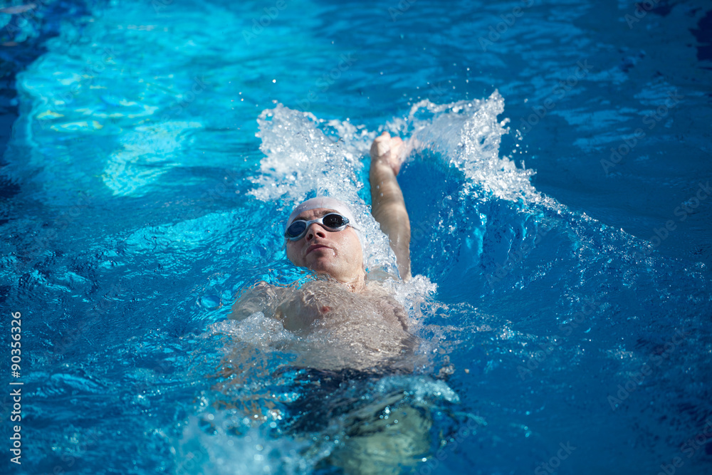 swimmer excercise on indoor swimming poo