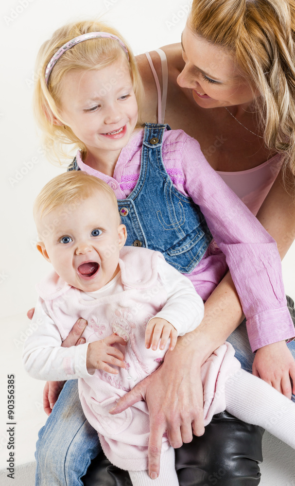 portrait of mother with her baby and daughter portrait of mother with her baby and daughter