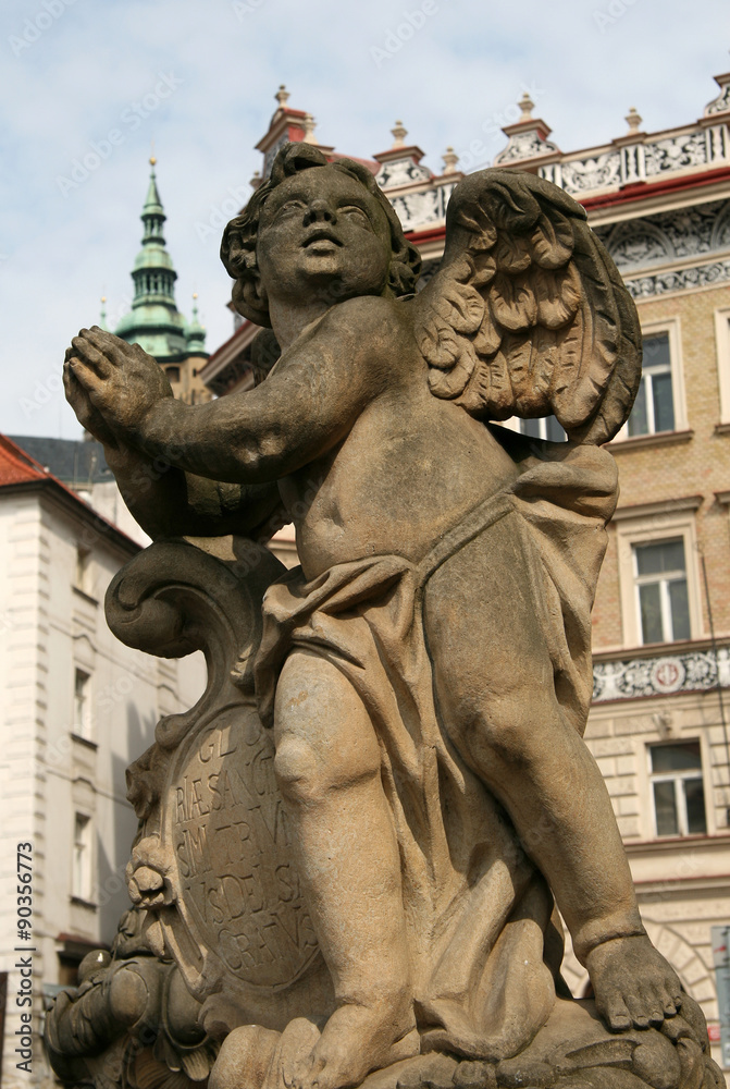 Obraz premium Statue on the Holy Trinity Column (Plague Column) at Lesser Town Square. Prague, Czech Republic