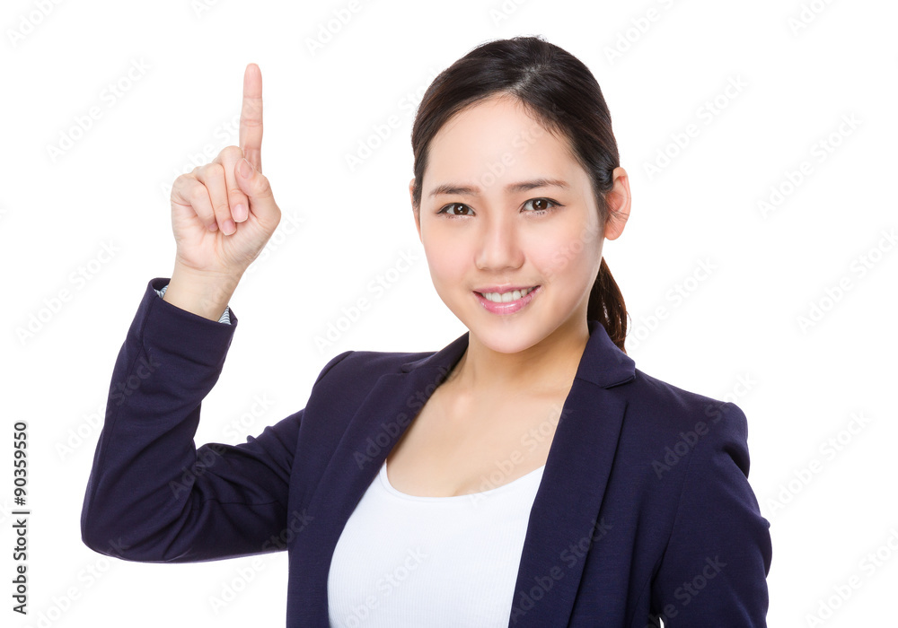 Young businesswoman with finger point up Young businesswoman with finger point up