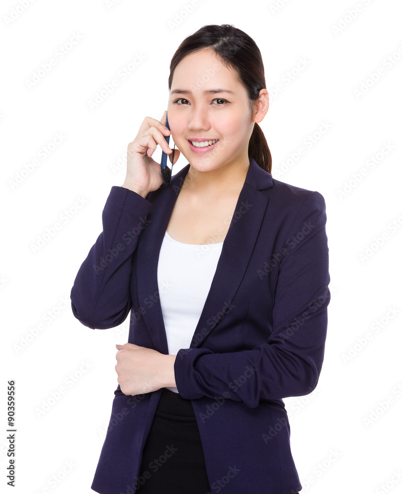 Asian businesswoman talk to cellphone Asian businesswoman talk to cellphone