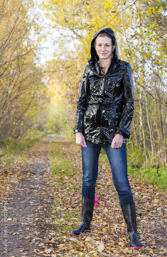 woman wearing rubber boots in autumnal nature Stock Photo | Adobe Stock