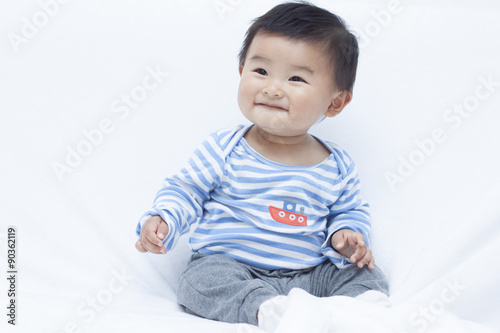 Cute Chinese baby boy in sailor suit