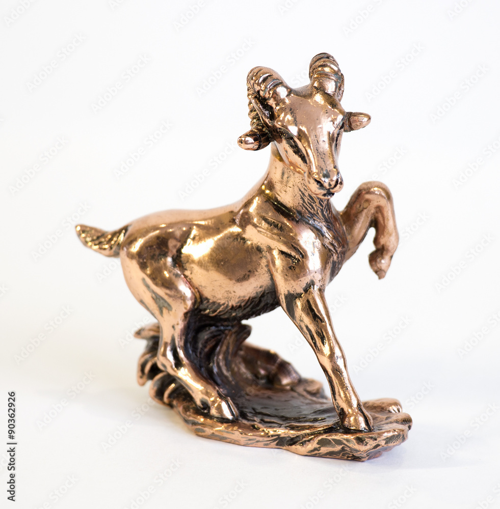 a bronze statuette of a ram a bronze statuette of a ram