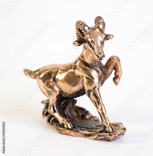 a bronze statuette of a ram © sv_production
