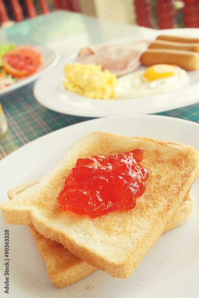 Slice toast bread with strawberry jam