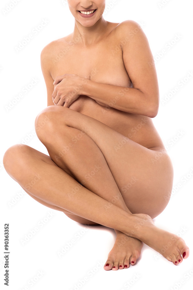 Obraz premium Nude woman sitting on floor