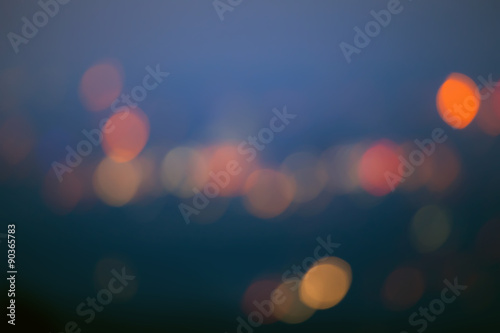 bokeh lights over the blue background, city abstract lights  © Svetoslav Sokolov
