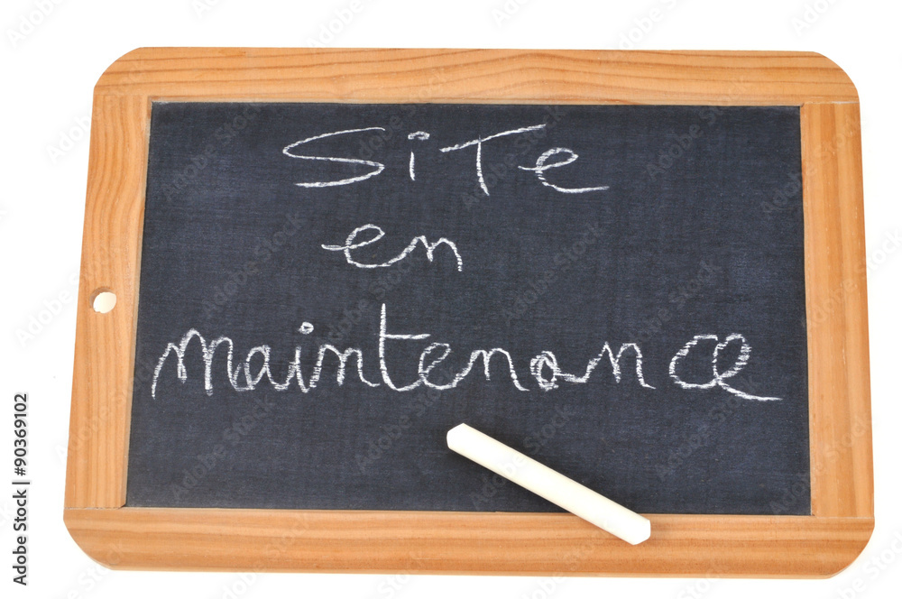 Ardoise avec site en maintenance écrit dessus Ardoise avec site en maintenance écrit dessus