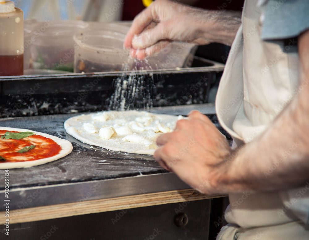 Pizza baker at work Pizza baker at work
