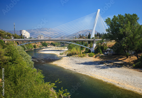 View of Millennium bridge over Moraca river in the center of Podgorica, Montenegro