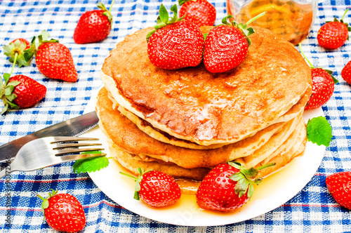 pancakes with fresh berries and honey