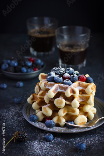 Canvas Print waffles with fresh berries and powdered sugar