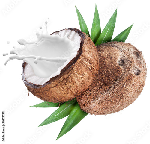 Coconut with milk splash inside.