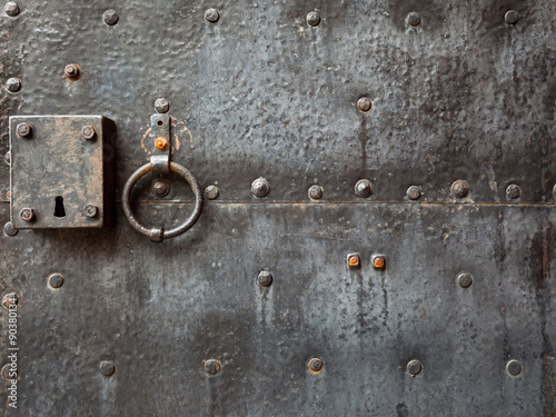 Fotografie Old door with door knocker